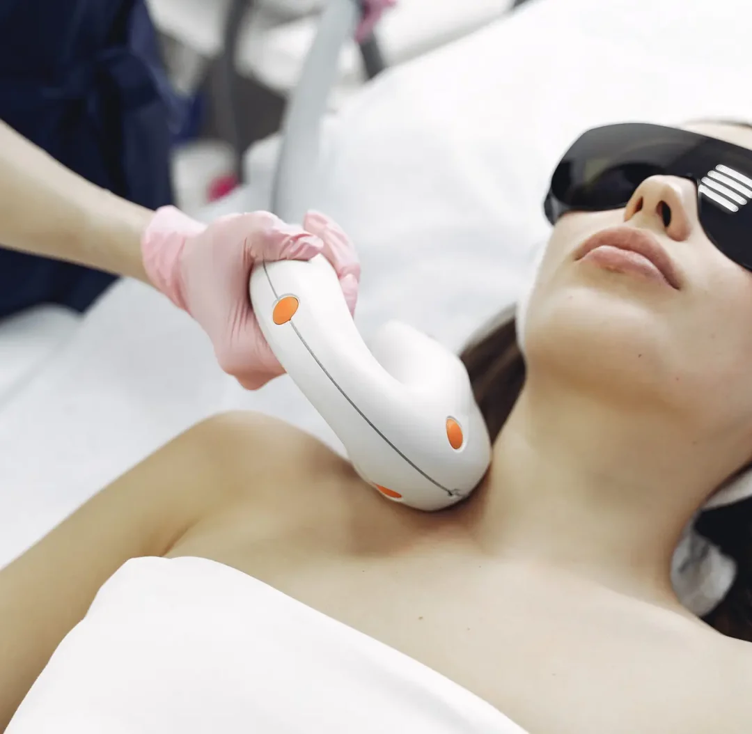 Woman in cosmetology studio on laser hair removal Laser hoito
